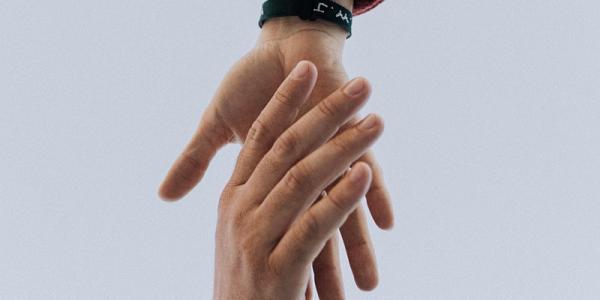 Two hands holding 